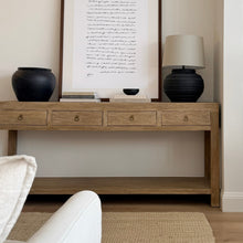 Load image into Gallery viewer, Reclaimed Elm Wood console table with decorative items in a room setting
